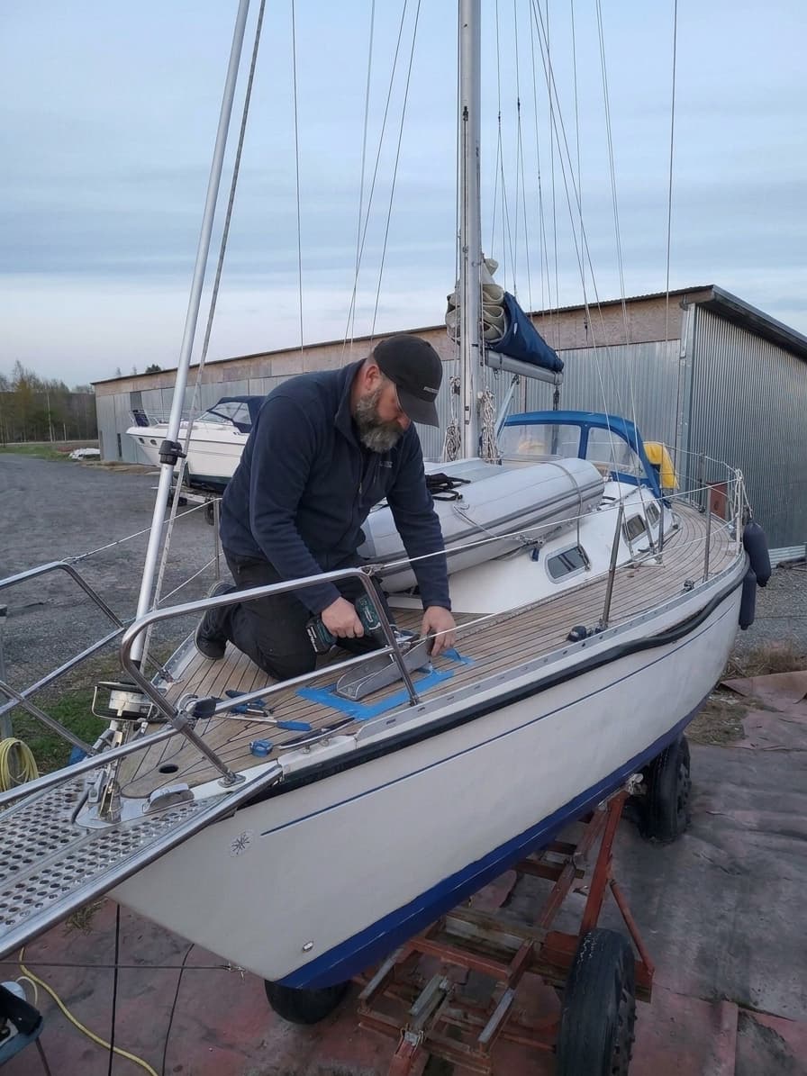 Deck hardware installation in progress on a yacht foredeck